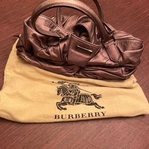Slouchy large steel colored leather Burberry bag. Extremely roomy with zipper's